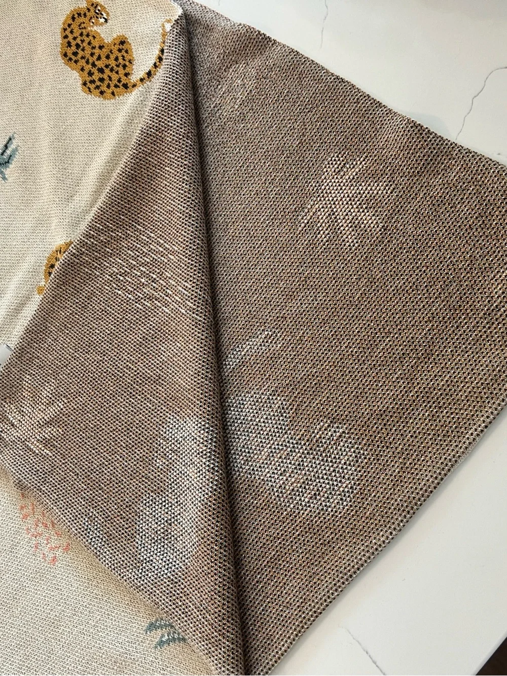Nicole Miller Cream Throw Blanket with Gold Leopard Motif